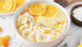 A Smoothie bowl with orange-creamsicle flavor is perfect for summer
