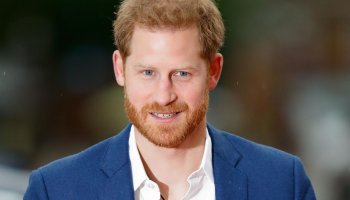 Despite Family Conflict, the Queen 'Adores' Prince Harry, Friend Says
