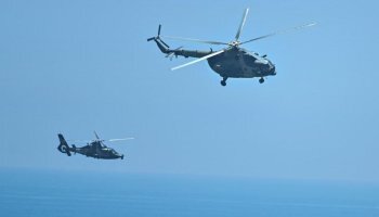 Taiwan says many Chinese aircraft and warships sighted in probable simulated attack